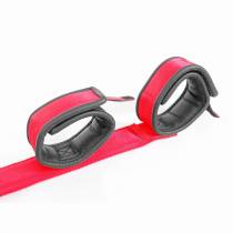 SPREIZSTANGE AUS ROTEM NYLON UND SCHWARZEM LEDER