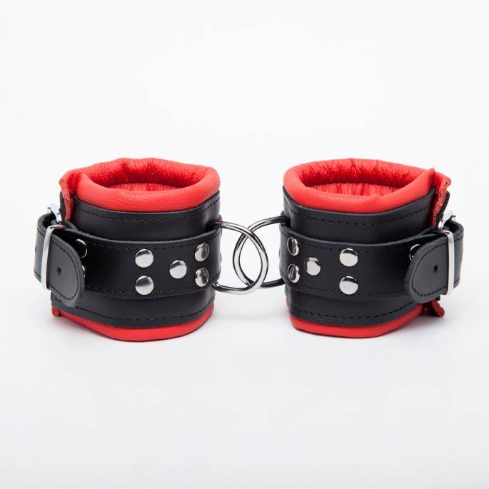 BLACK AND RED LEATHER HANDCUFFS