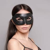 Maske aus schwarzem Leder Arabesken