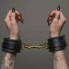 LEATHER HANDCUFFS GOLD RING