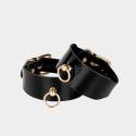 Menottes de chevilles en cuir noir et or