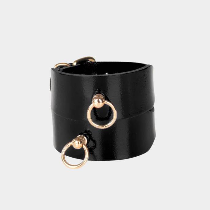 Menottes de chevilles en cuir noir et or