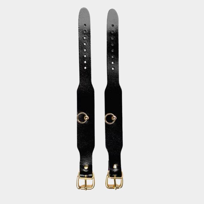 Menottes de chevilles en cuir noir et or