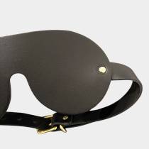 Masque BDSM cuir noir boucle dorée